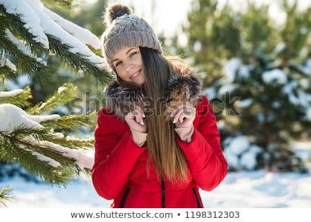 Foto d'archivio: Portrait Of Beautiful Young Red Hair Woman Outdoors In Winter Lo