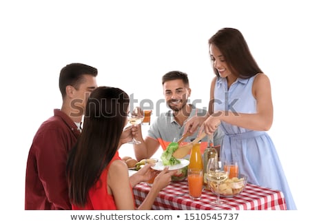 Stockfoto: Smiling Young Woman With Salad Against A White Background