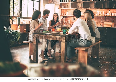 Foto stock: Friends Enjoying Dinner At Home