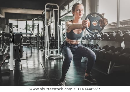 Сток-фото: Woman Doing Exercises In Gym