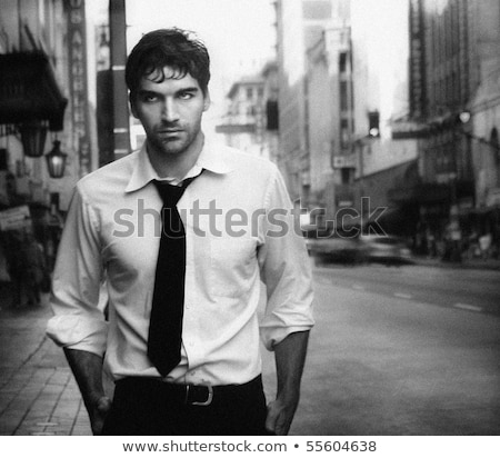 Stok fotoğraf: Dynamic Photo Of A Fashionable Guy