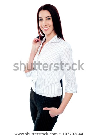 Stok fotoğraf: Stylish Female Executive Holding Coat Over Her Shoulders