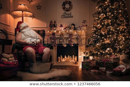 ストックフォト: Merry Christmas Santa Claus Sleeping On Chair