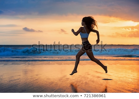 Foto stock: Jumping Sporty Girl