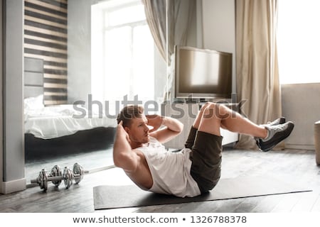 Stock photo: Handsome Athletic Young Man Posing