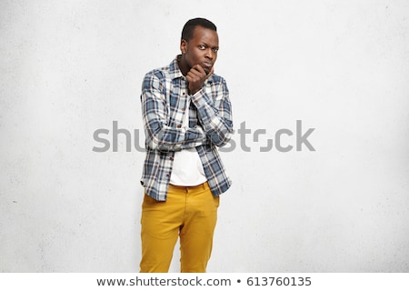 Stock foto: Disdainful Businessman Raising An Eyebrow