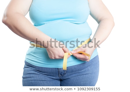 ストックフォト: Fat Woman Measuring Her Stomach