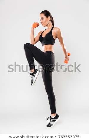 Stock fotó: Beautiful Sport Woman With Dumbbells Doing Sport Exercise Isola