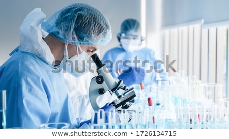 Stockfoto: Rouwelijke · onderzoeker · op · het · werk