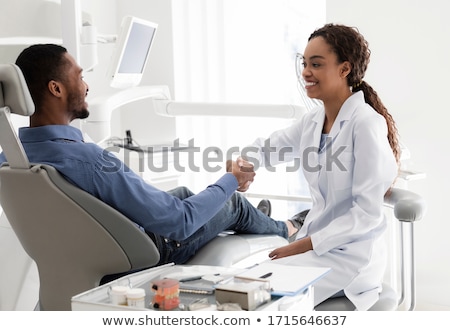 Stockfoto: Dentist Hands Treating Male Patient Teeth
