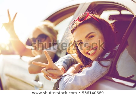 Stockfoto: Happy Teenage Girls Or Women Driving In Car