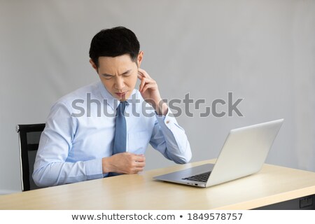 Stock photo: Asian Businessman With Pressure About This Work