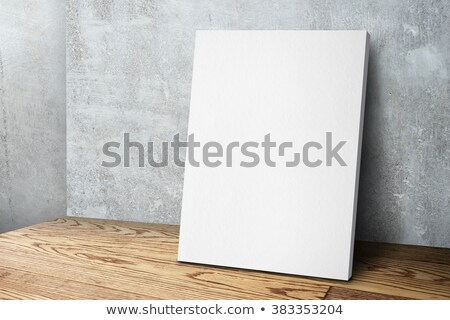 Stock photo: Blank White Poster Mock Up Leaning On Grunge Studio Wall