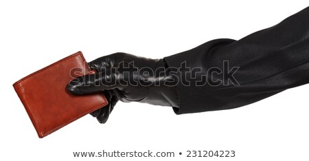 Stock fotó: Thief In Black Suit Holding A Brown Leather Purse