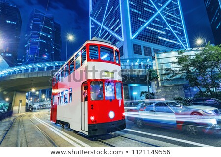 Foto stock: Hong Kpng Cityscape With Taxi Car At Night City Street