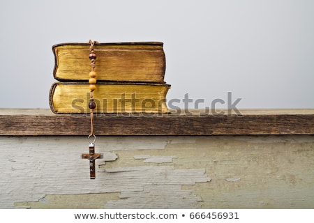 Foto stock: Catholic Wooden Crucifix And Book