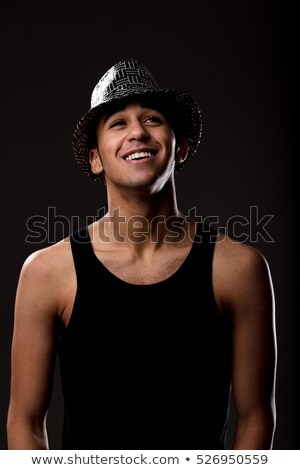 Foto d'archivio: Sly Smile For A Handsome Guy In Sequin Hat