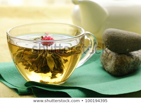 Zdjęcia stock: Exotic Green Tea In The Form Of A Flower In Glass