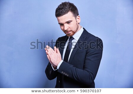 Stock foto: Elegant Man In Tuxedo Rubbing His Palms Together