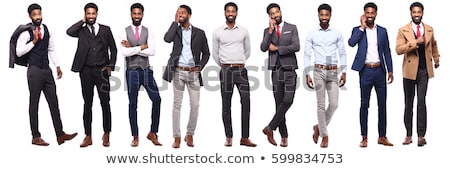 Foto stock: Portrait Of A Handsome Young Man Dressed In Suit