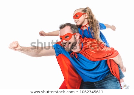 Stockfoto: Girl And Daddy In Superhero Costume