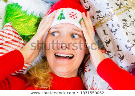 Foto stock: Exhausted Woman Christmas Shopping