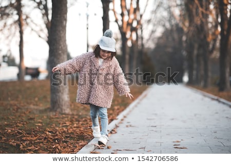 Stock fotó: The Beautiful Girl In The Winter In Park 4