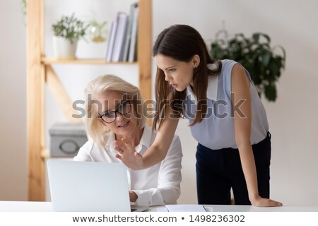 Stock photo: Young Female Boss At The Table