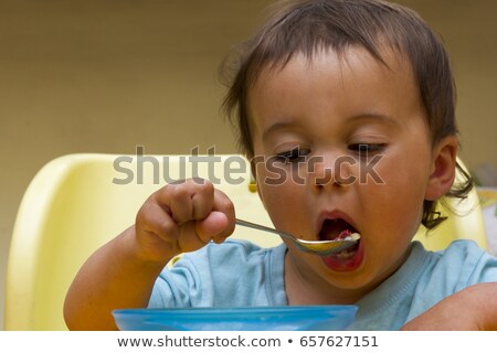 [[stock_photo]]: Baby Girl In Highchair