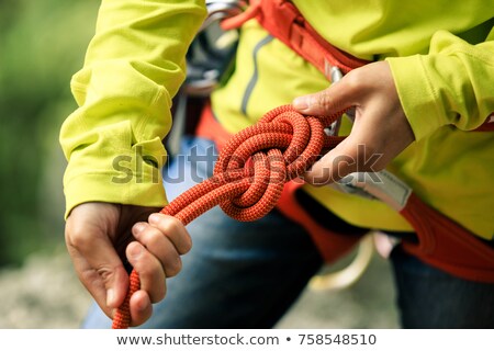 [[stock_photo]]: Determined Woman Wearing Safety Harness