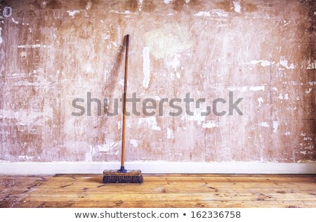 Foto stock: Wall With Broom
