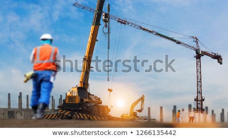 Stock fotó: Buildings With Cranes And Machinery Workers Set