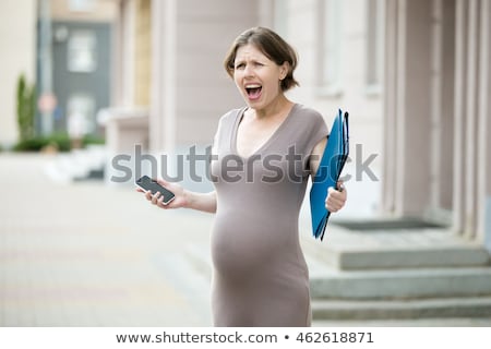 Stock photo: Portrait Of An Angry Irritated Pregnant Woman Yelling