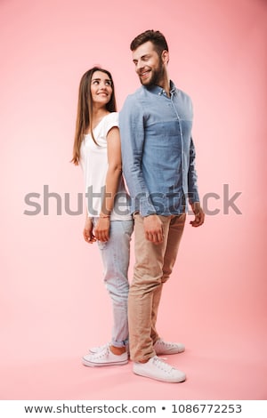ストックフォト: Full Length Portrait Of A Happy Young Couple In Love