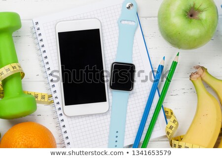 [[stock_photo]]: Fitness Concept Dumbbells And Tape Measure