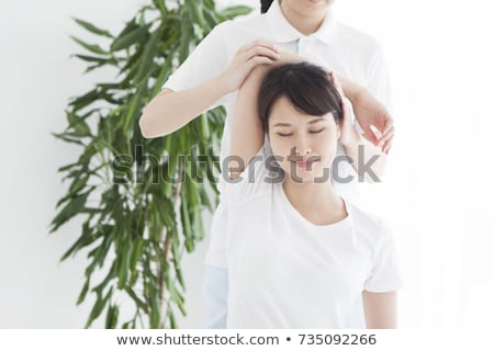Stock photo: Woman Receiving Shoulders Massage
