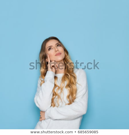 Stock photo: Young Woman Thinking With Copy Space