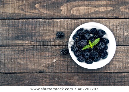Stock fotó: Blackberries On A Wooden Table