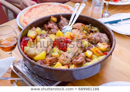 [[stock_photo]]: Traditional Croatian Meat And Vegetables Dish Peka