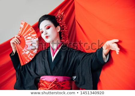 Stock fotó: Beautiful Geisha Dancing With A Fan