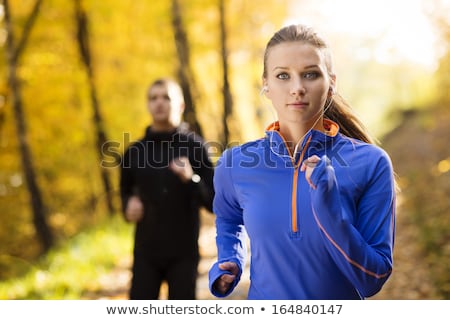 Stock photo: Two Young Girls Jogging Outdoors