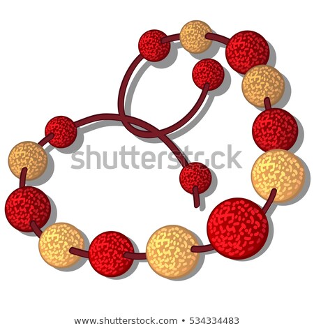 Foto d'archivio: Decoration In The Form Of Beads Made Of Crumpled Foil In Red And Golden Color Isolated On White Back