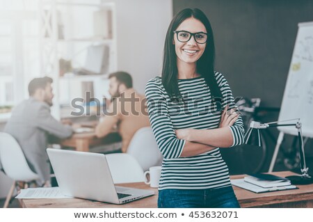 Stok fotoğraf: Woman Leader And Her Casual Team Smiling