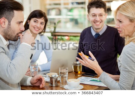 Stockfoto: Relaxed Managers Communicating Cheerfully