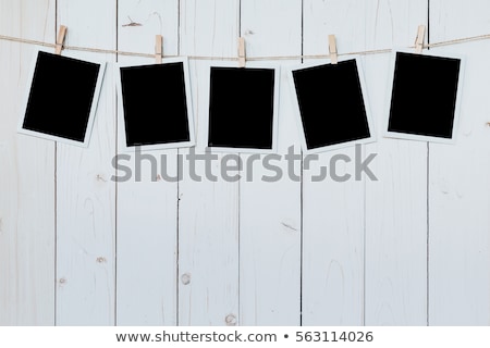 Stok fotoğraf: Photography Paper Attached To Rope With Clothes Pins
