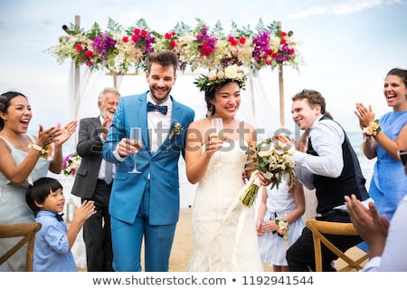 Stock fotó: Bride And Groom Drinking Champagne At Wedding