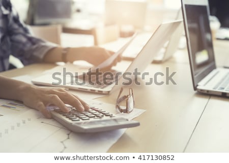 Foto stock: Notebook And Calculator