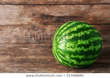 Foto stock: Fresh Watermelon On A Wood Table