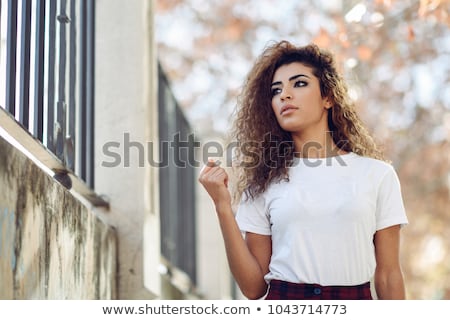 [[stock_photo]]: Portrait Of Beautiful Brunette Woman Wearing A White T Shirt