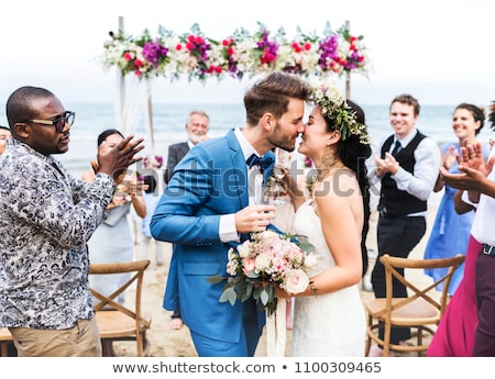 Foto stock: Beach Wedding Bride And Groom